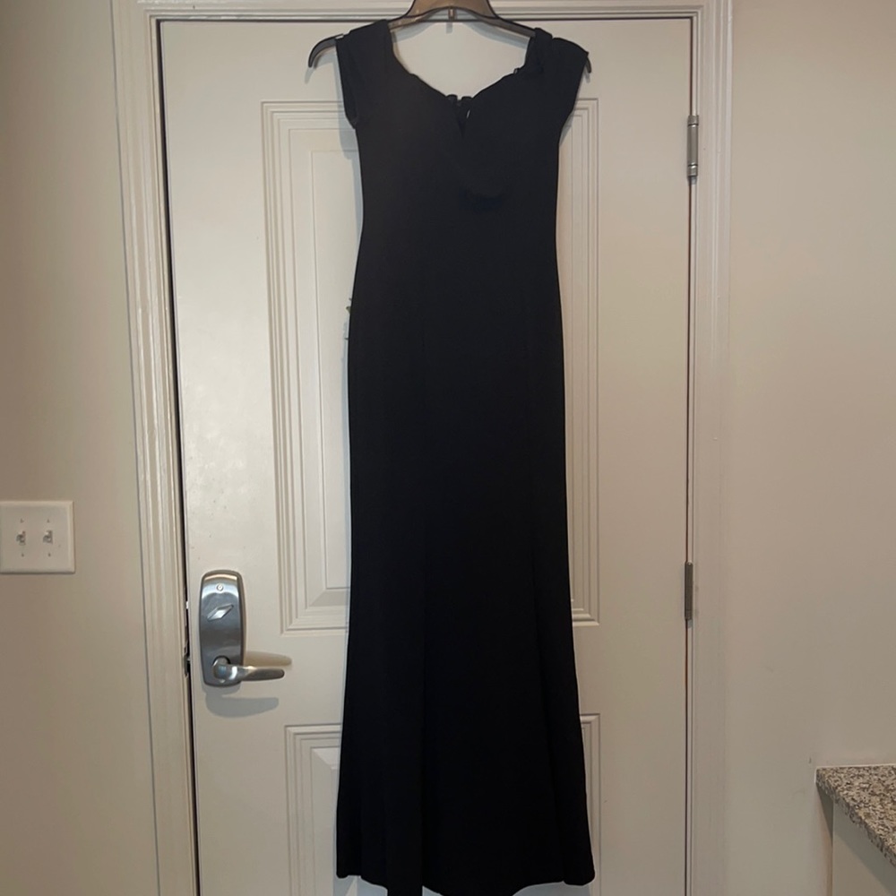 Long black Calvin Klein dress.